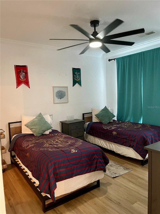 8010 Tuscany Way Unit 3102, Davenport, FL 33896 - bedroom featuring crown molding, wood finished floors, and ceiling fan
