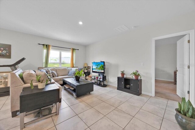 145 Piave St, Haines City, FL 33844 - living area with light tile patterned flooring