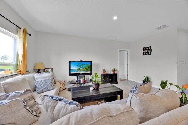 145 Piave St, Haines City, FL 33844 - living area featuring light tile patterned floors