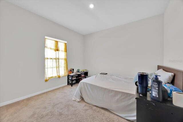 145 Piave St, Haines City, FL 33844 - carpeted bedroom with baseboards