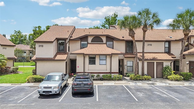 3118 S Semoran Blvd Unit 2, Orlando, FL 32822 - view of building exterior featuring uncovered parking