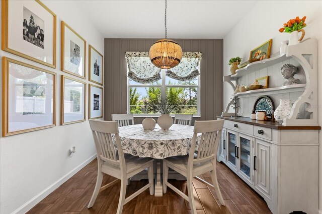922 Grazie Loop, Davenport, FL 33837 - dining area with a chandelier and dark wood-style flooring