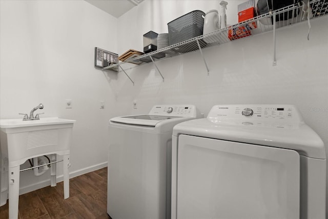 922 Grazie Loop, Davenport, FL 33837 - washroom featuring washing machine and dryer and wood finished floors