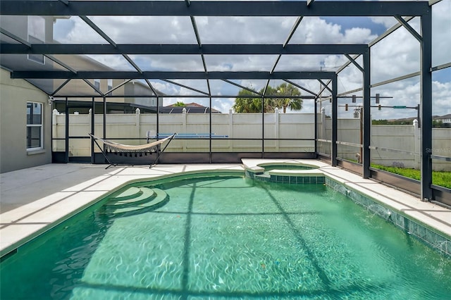 1224 Blackwater Pond Dr, Orlando, FL 32828 - view of swimming pool featuring a patio area, a lanai, and a pool with connected hot tub