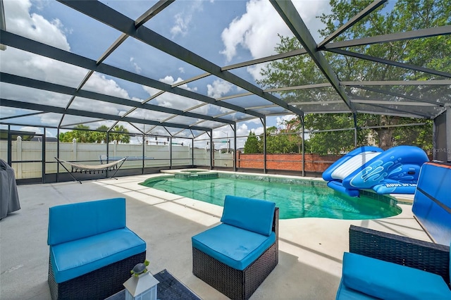 1224 Blackwater Pond Dr, Orlando, FL 32828 - view of pool featuring a patio area, a fenced backyard, a lanai, and a pool with connected hot tub