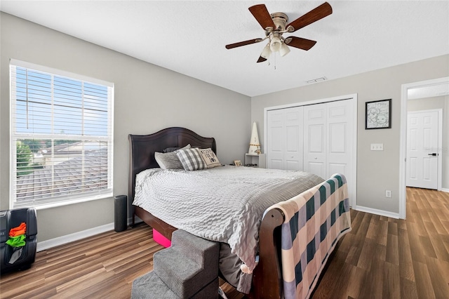 1224 Blackwater Pond Dr, Orlando, FL 32828 - bedroom featuring wood finished floors, multiple windows, and a closet