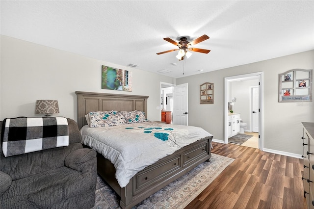 1224 Blackwater Pond Dr, Orlando, FL 32828 - bedroom featuring dark wood-type flooring, ensuite bathroom, and ceiling fan