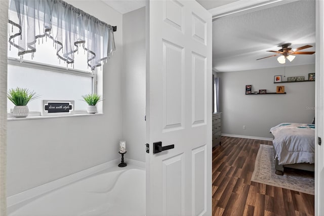 1224 Blackwater Pond Dr, Orlando, FL 32828 - bedroom featuring wood finished floors and baseboards