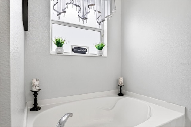 1224 Blackwater Pond Dr, Orlando, FL 32828 - bathroom with a garden tub