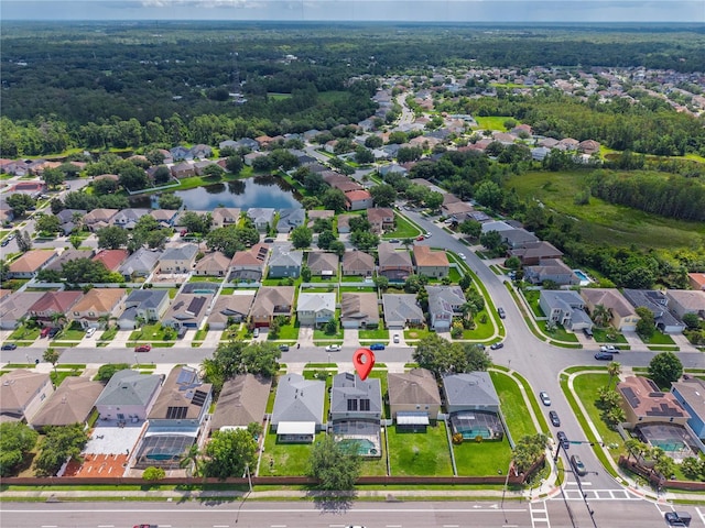 1224 Blackwater Pond Dr, Orlando, FL 32828 - aerial view of property and surrounding area featuring nearby suburban area and a nearby body of water