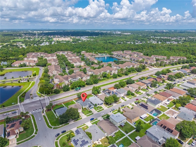 1224 Blackwater Pond Dr, Orlando, FL 32828 - aerial overview of property's location with a large body of water and nearby suburban area