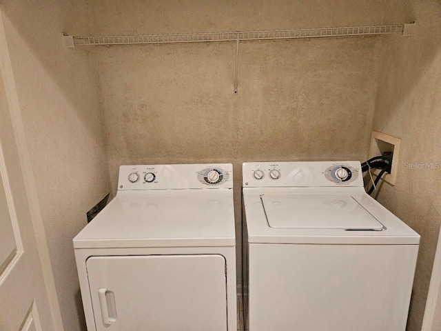 6214 Stevenson Dr Unit 208, Orlando, FL 32835 - laundry area featuring independent washer and dryer
