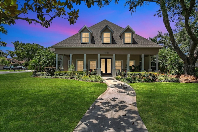 19554 Spring Oak Dr, Eustis, FL 32736 - view of front of property with roof with shingles, a yard, and covered porch
