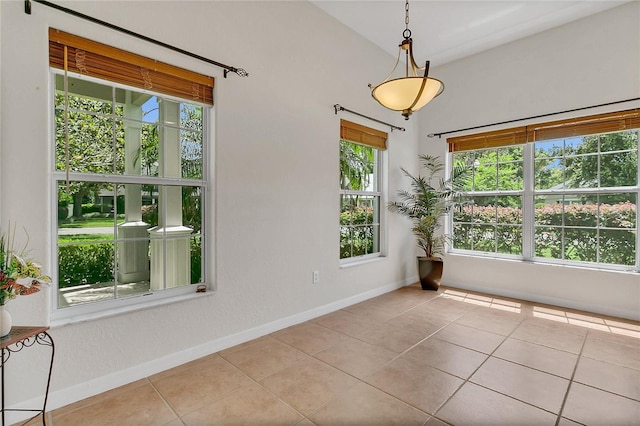 19554 Spring Oak Dr, Eustis, FL 32736 - unfurnished dining area with tile patterned flooring and baseboards