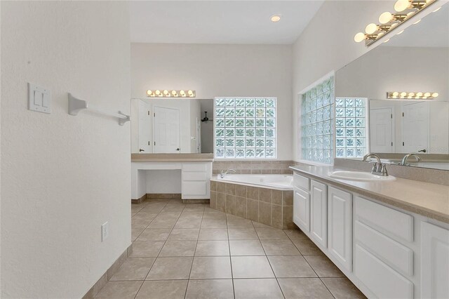 19554 Spring Oak Dr, Eustis, FL 32736 - bathroom featuring a bath, tile patterned floors, and vanity