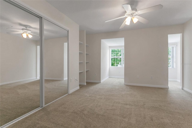 19554 Spring Oak Dr, Eustis, FL 32736 - carpeted spare room featuring a ceiling fan and baseboards