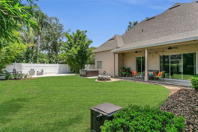 19554 Spring Oak Dr, Eustis, FL 32736 - fenced yard featuring a hot tub, a patio area, and ceiling fan