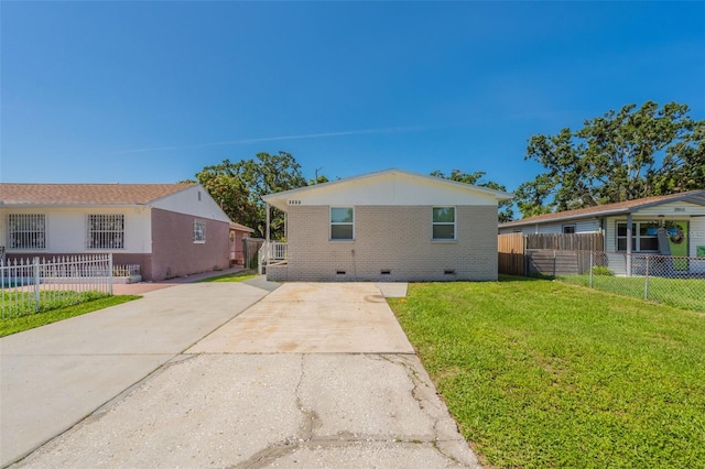 3850 11th Ave S, Saint Petersburg, FL 33711 - back of property featuring crawl space, brick siding, and driveway