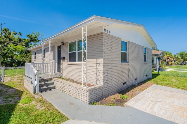 3850 11th Ave S, Saint Petersburg, FL 33711 - view of front of home featuring crawl space and brick siding