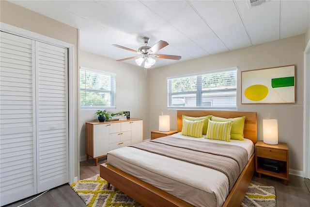 3850 11th Ave S, Saint Petersburg, FL 33711 - bedroom with wood finished floors, a closet, and ceiling fan