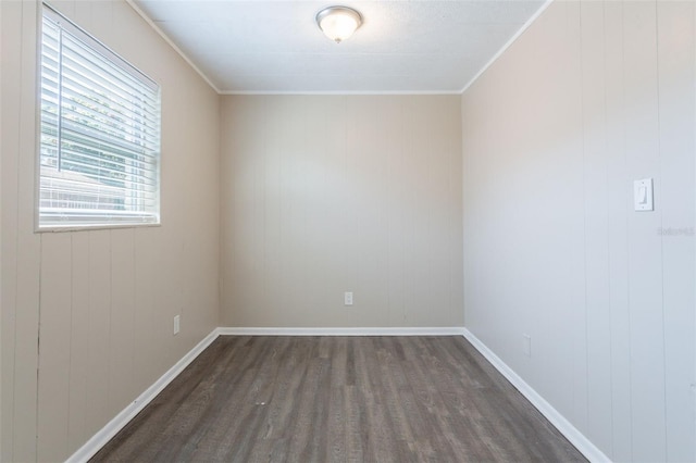 3850 11th Ave S, Saint Petersburg, FL 33711 - spare room featuring dark wood-style flooring and ornamental molding