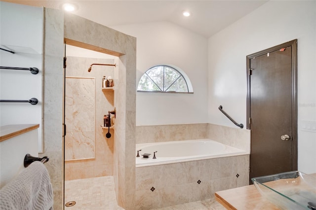 2406 Sweetwater Blvd, Saint Cloud, FL 34772 - bathroom with a bath, a walk in shower, lofted ceiling, vanity, and tile patterned floors