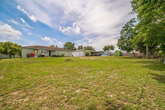 6401 Fortune Ln, Apopka, FL 32712 - view of yard featuring a storage shed