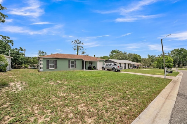 6401 Fortune Ln, Apopka, FL 32712 - ranch-style home with a front lawn and concrete driveway