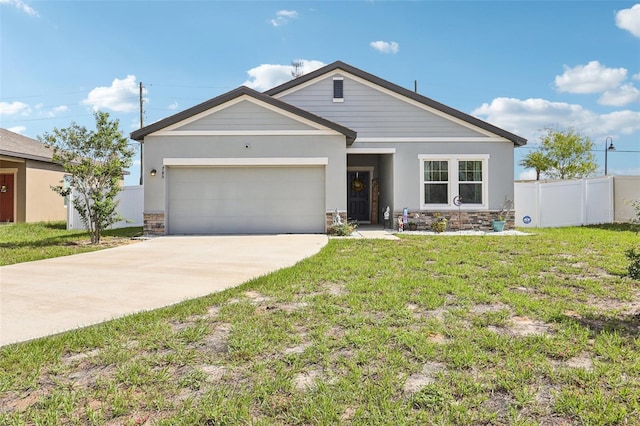 785 Orchid Grove Blvd, Davenport, FL 33837 - single story home with stone siding, an attached garage, and driveway
