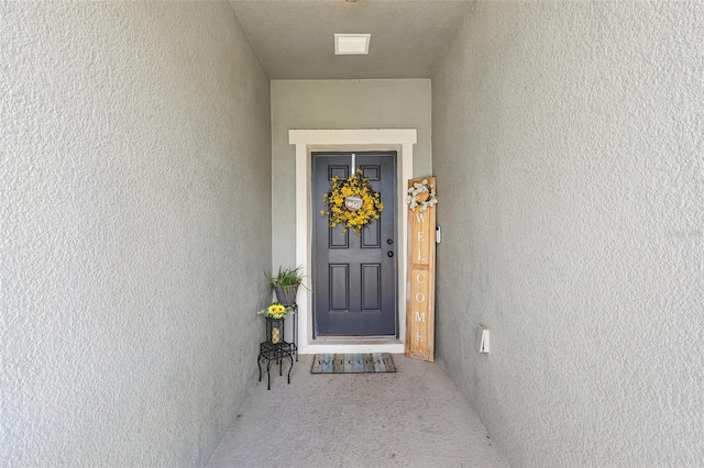 785 Orchid Grove Blvd, Davenport, FL 33837 - view of exterior entry with stucco siding