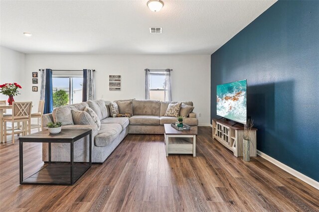 785 Orchid Grove Blvd, Davenport, FL 33837 - living room with plenty of natural light and wood finished floors