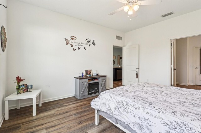 785 Orchid Grove Blvd, Davenport, FL 33837 - bedroom featuring wood finished floors and baseboards