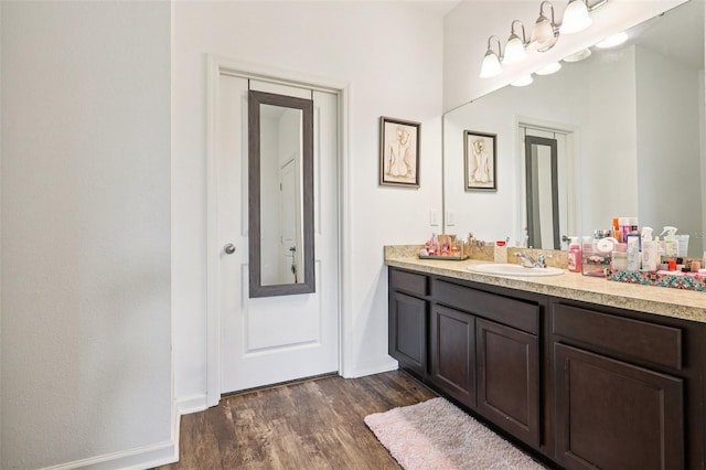 785 Orchid Grove Blvd, Davenport, FL 33837 - bathroom featuring vanity and wood finished floors