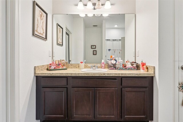 785 Orchid Grove Blvd, Davenport, FL 33837 - full bathroom featuring vanity