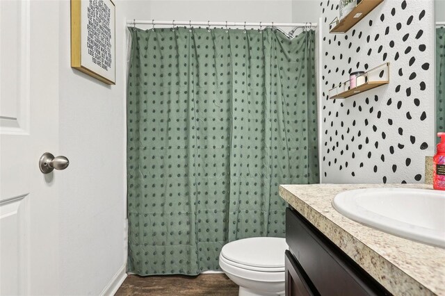 785 Orchid Grove Blvd, Davenport, FL 33837 - bathroom with vanity, wood finished floors, and curtained shower