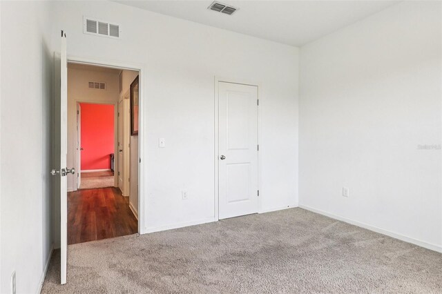 785 Orchid Grove Blvd, Davenport, FL 33837 - unfurnished bedroom featuring carpet flooring and baseboards