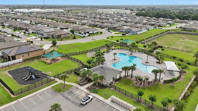 785 Orchid Grove Blvd, Davenport, FL 33837 - drone / aerial view of a pool