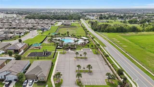 785 Orchid Grove Blvd, Davenport, FL 33837 - aerial view of residential area with a pool area