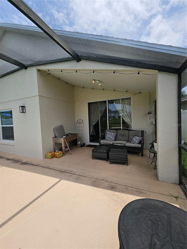 2817 Moultrie Creek Dr, Kissimmee, FL 34743 - view of patio with outdoor lounge area