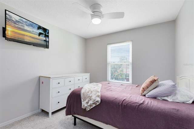 4478 Yachtmans Ct, Orlando, FL 32812 - bedroom featuring light colored carpet and a ceiling fan