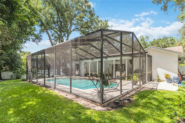 205 Stevenage Dr, Longwood, FL 32779 - outdoor pool featuring a patio, a lawn, and a ceiling fan