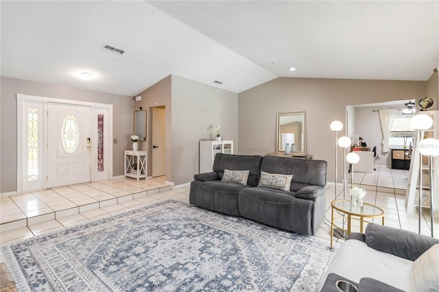 205 Stevenage Dr, Longwood, FL 32779 - living room featuring tile patterned flooring and lofted ceiling