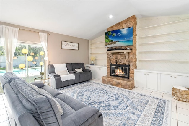 205 Stevenage Dr, Longwood, FL 32779 - living area featuring light tile patterned flooring, vaulted ceiling, a fireplace, and built in features