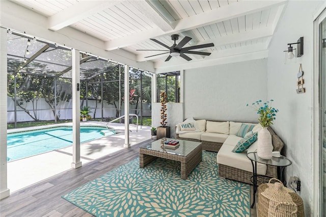 205 Stevenage Dr, Longwood, FL 32779 - sunroom / solarium with a swimming pool, beam ceiling, a ceiling fan, and an outdoor living space