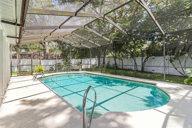 205 Stevenage Dr, Longwood, FL 32779 - view of swimming pool featuring a fenced backyard, a patio, and glass enclosure