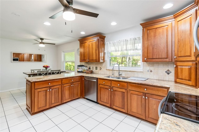 205 Stevenage Dr, Longwood, FL 32779 - kitchen with dishwasher, a peninsula, healthy amount of natural light, ceiling fan, and recessed lighting