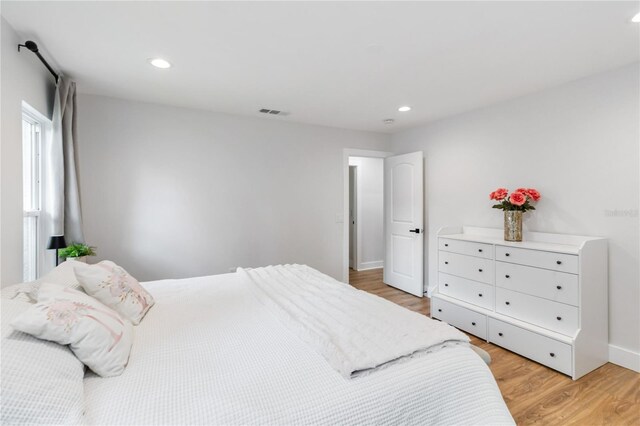 205 Stevenage Dr, Longwood, FL 32779 - bedroom with light wood-style floors and recessed lighting