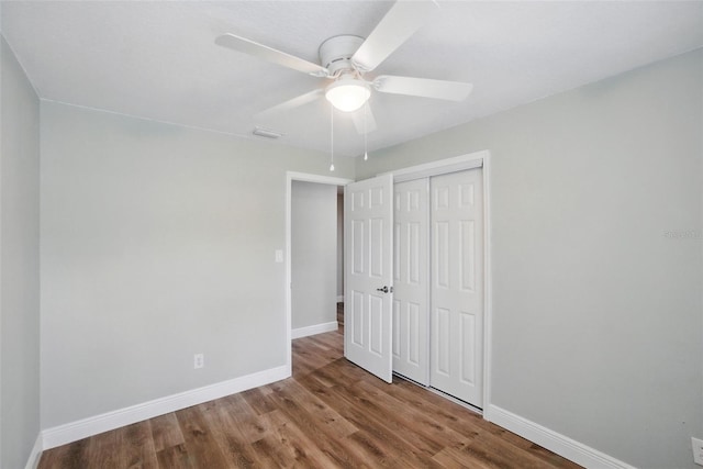 841 Wesson Ct, Casselberry, FL 32707 - unfurnished bedroom with wood finished floors, a closet, and ceiling fan