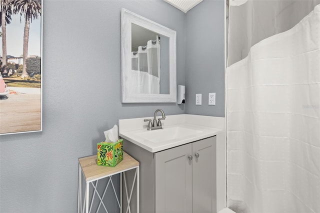 8303 Palm Pkwy Unit 402, Orlando, FL 32836 - bathroom featuring vanity and a shower with curtain