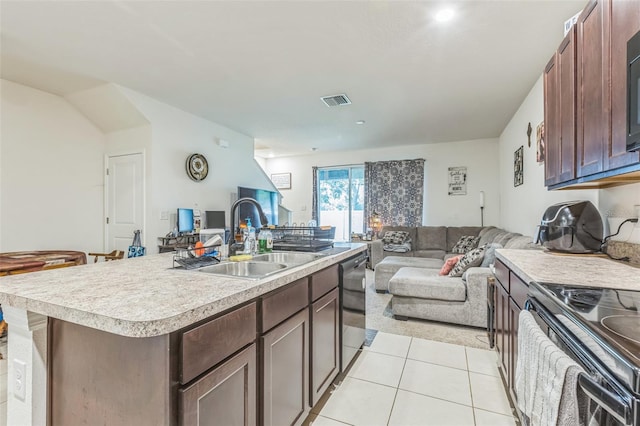819 Lucent Sands Ct, Brandon, FL 33511 - kitchen with open floor plan, light countertops, light tile patterned flooring, and stainless steel dishwasher